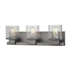 Hotelier 3-Light Weathered Zinc with Clear Glass Bath Light by Titan Lighting